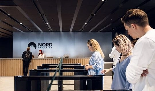 Nord Security office reception area with employees greeting visitors