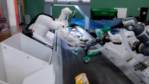 Robots sorting waste at a waste management facility